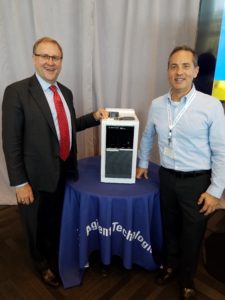  Lee Polite (Founder and President of Axion Labs) and Mike McMullen (CEO of Agilent Technologies) pictured with the new 